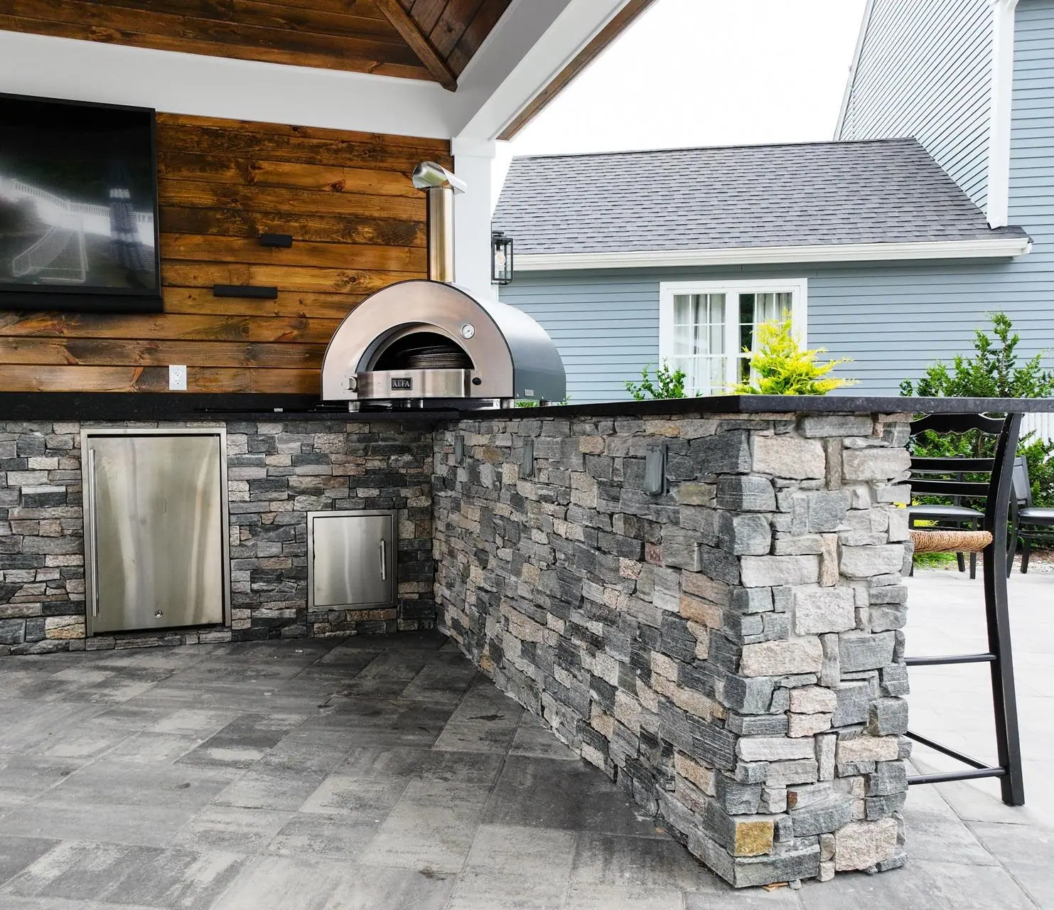 Outdoor kitchen project in Kingston, MA 02364 by Contrast Landscape
