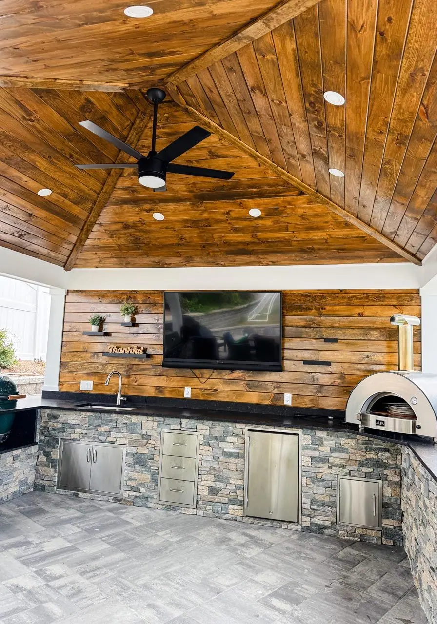 Outdoor kitchen project in Kingston, MA 02364 by Contrast Landscape