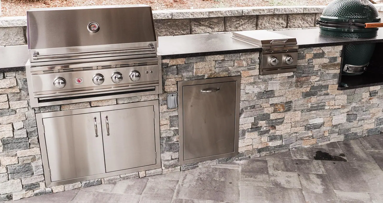 Outdoor kitchen project in Kingston, MA 02364 by Contrast Landscape