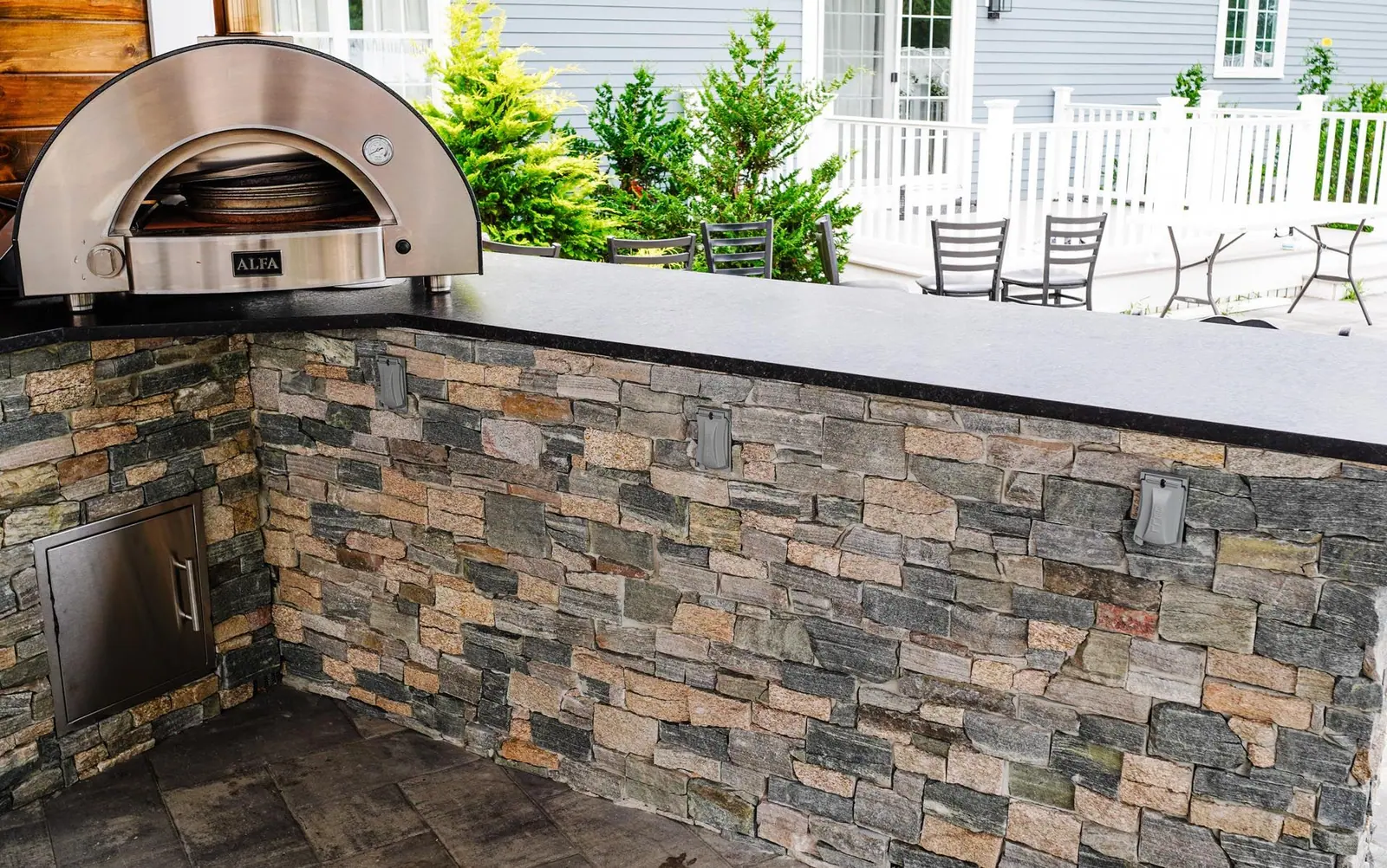 Outdoor kitchen project in Kingston, MA 02364 by Contrast Landscape