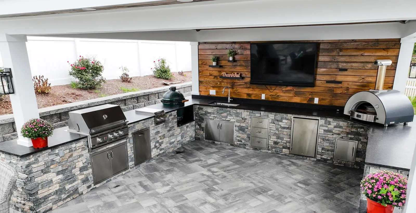 Outdoor kitchen project in Kingston, MA 02364 by Contrast Landscape