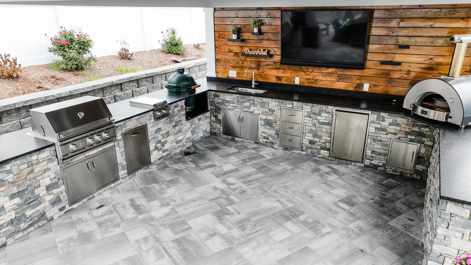 Outdoor kitchen project in Kingston, MA 02364 by Contrast Landscape