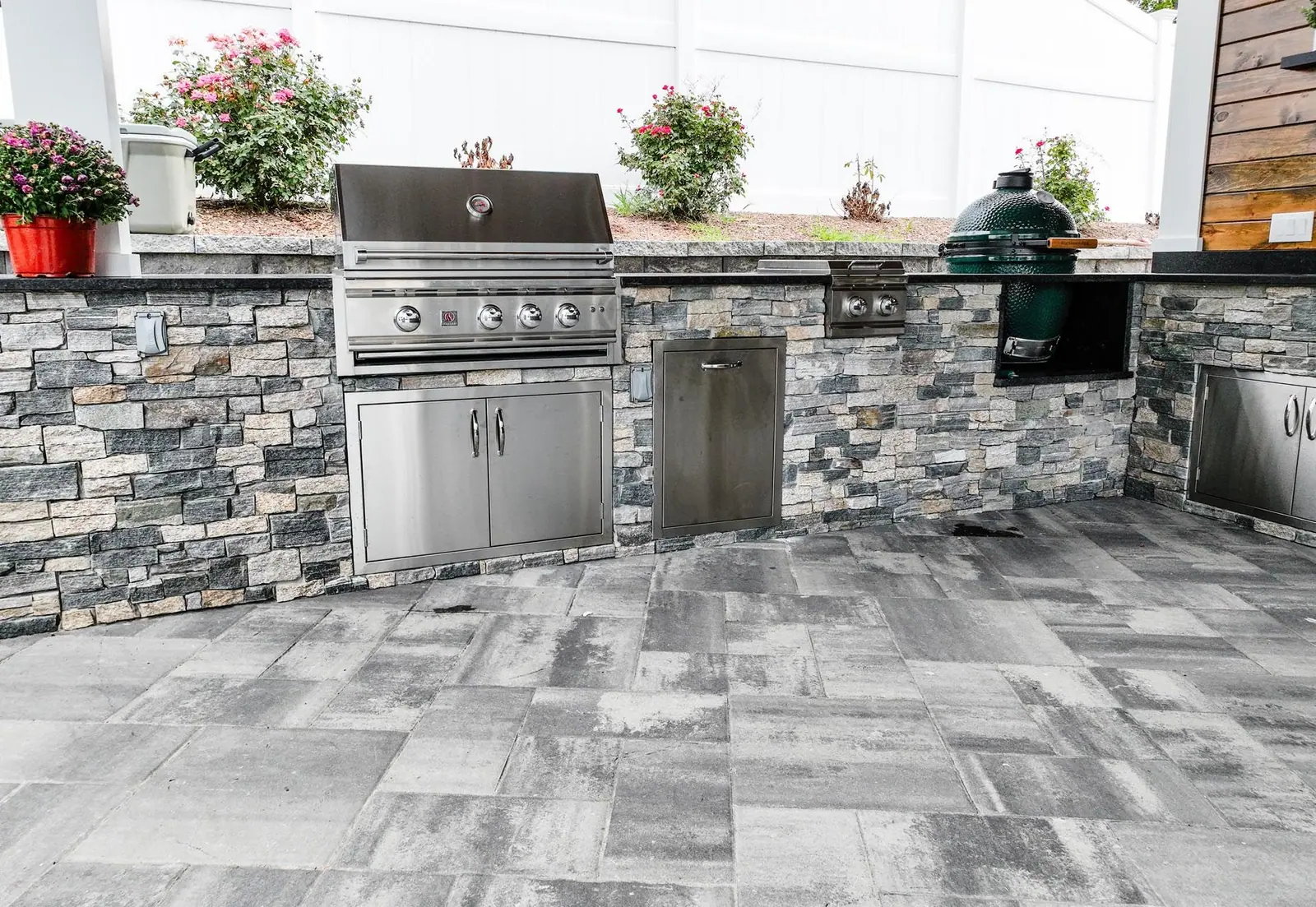 Outdoor kitchen project in Kingston, MA 02364 by Contrast Landscape